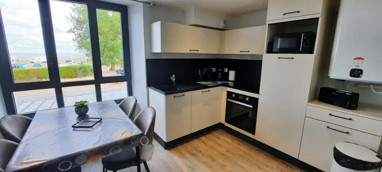 Les Appartements De La B Saint-Benoît-des-Ondes Exterior foto