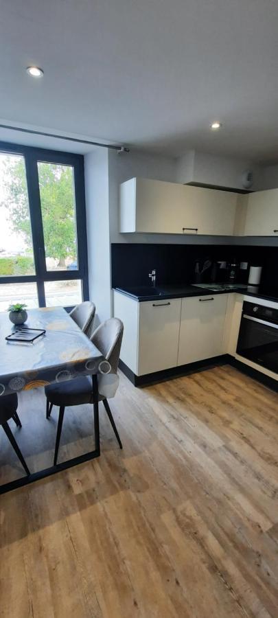 Les Appartements De La B Saint-Benoît-des-Ondes Exterior foto